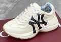 Gucci Cream Chunky Sneakers with Black Accents