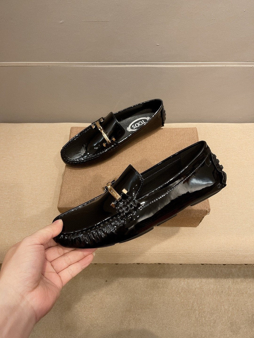 Tod's Glossy Metal Bar Loafers