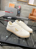 Prada Men's Gold Accent Low-Top Sneakers